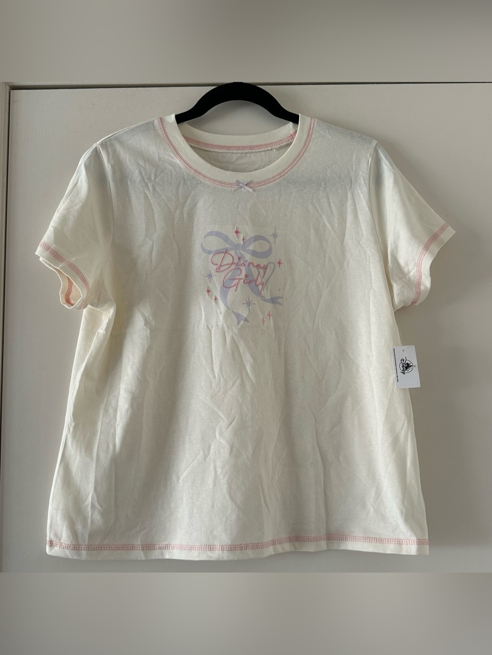 Disney Girly White Short Sleeve Tee With Pink Accents and Lavender Bow
SZ L